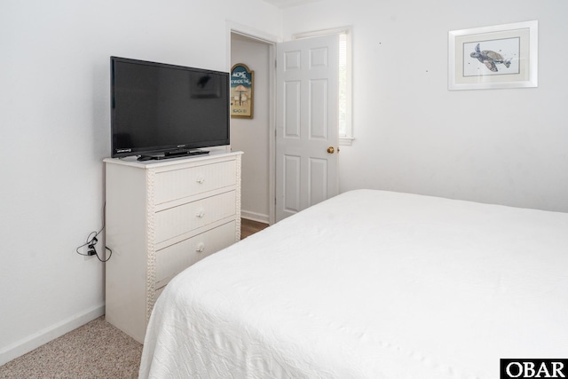 631 Skimmer Ct Lot 17, Corolla, NC 27927 - bedroom with baseboards and carpet floors