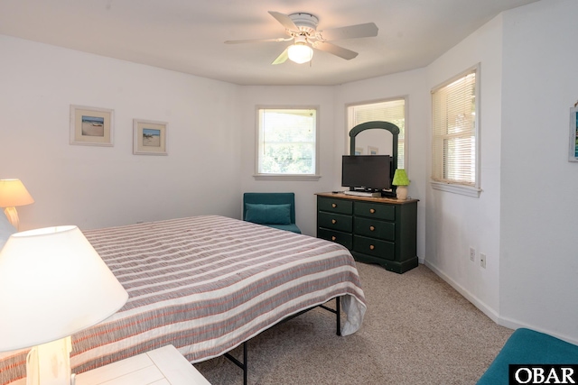 631 Skimmer Ct Lot 17, Corolla, NC 27927 - bedroom with light colored carpet and ceiling fan