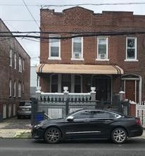 townhome / multi-family property featuring a porch