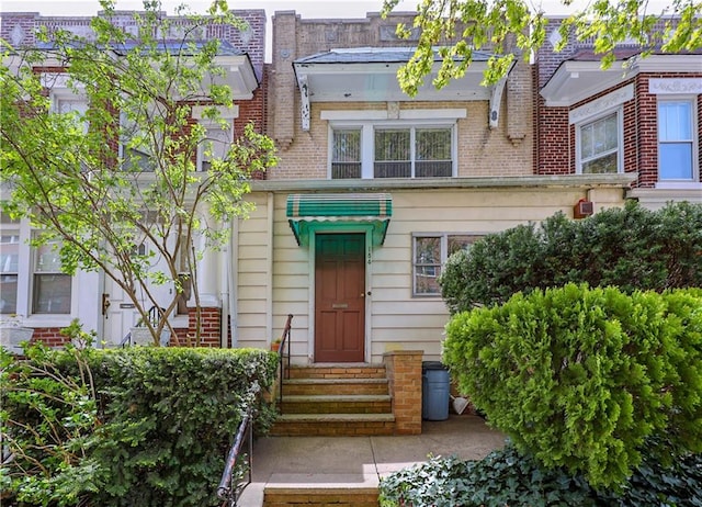 view of front of property with brick siding
