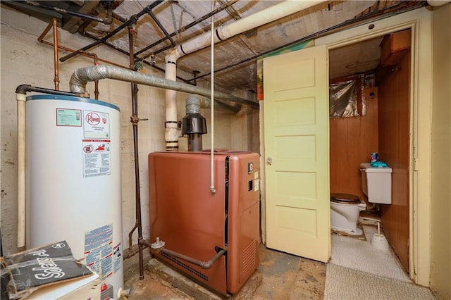 utility room featuring water heater