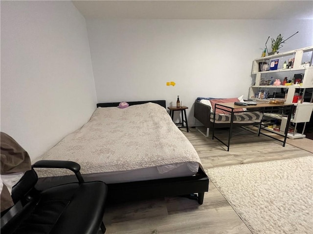 bedroom featuring light wood-type flooring