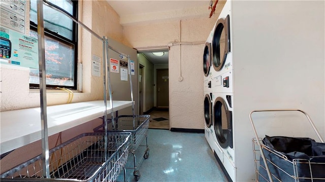 laundry room featuring separate washer and dryer and stacked washer and dryer