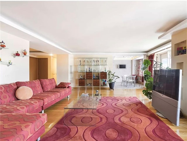 living room with light hardwood / wood-style flooring