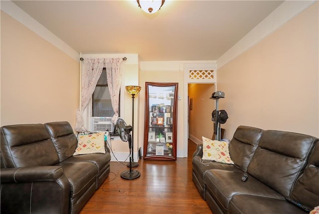 living room with dark hardwood / wood-style floors and cooling unit