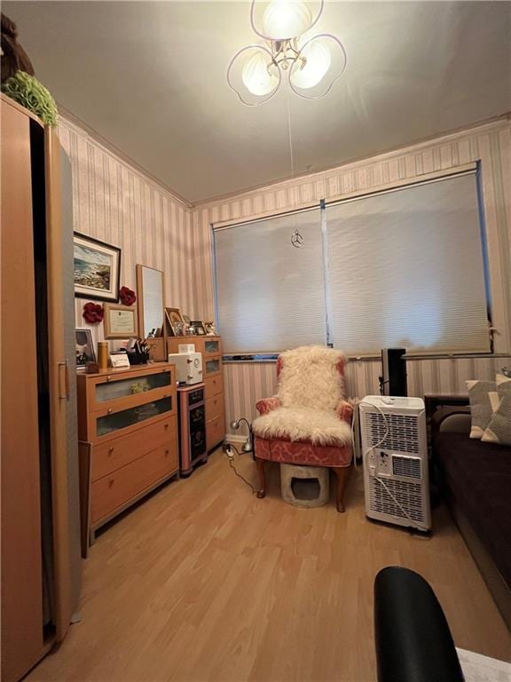 sitting room with light hardwood / wood-style flooring