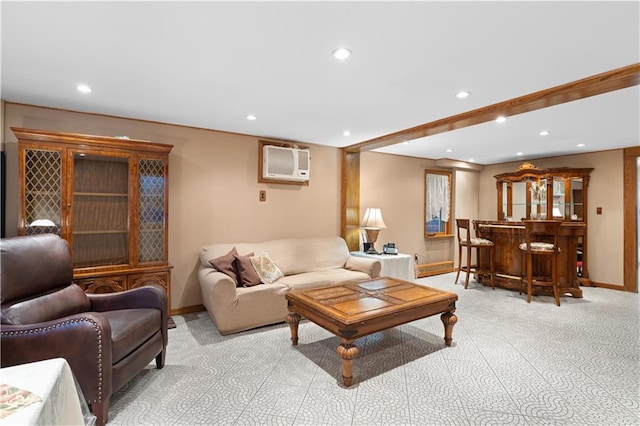 living area with a wall unit AC, recessed lighting, light colored carpet, baseboards, and a bar