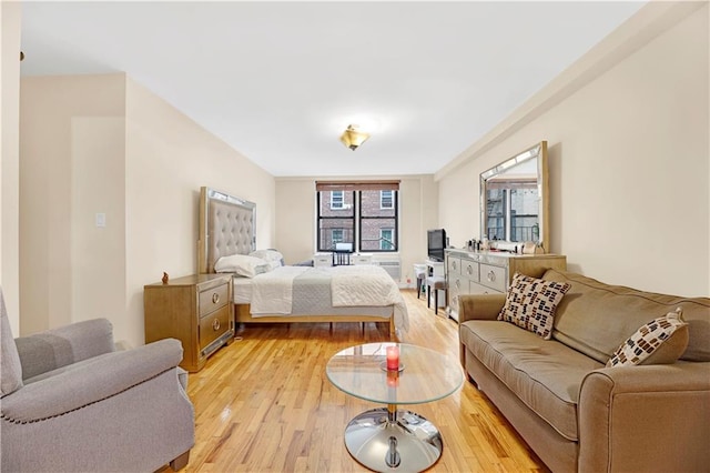 bedroom with light hardwood / wood-style flooring