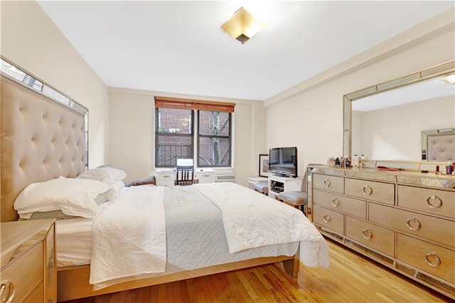 bedroom featuring hardwood / wood-style flooring