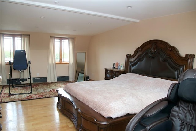 bedroom with light hardwood / wood-style flooring