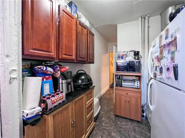 kitchen featuring white fridge