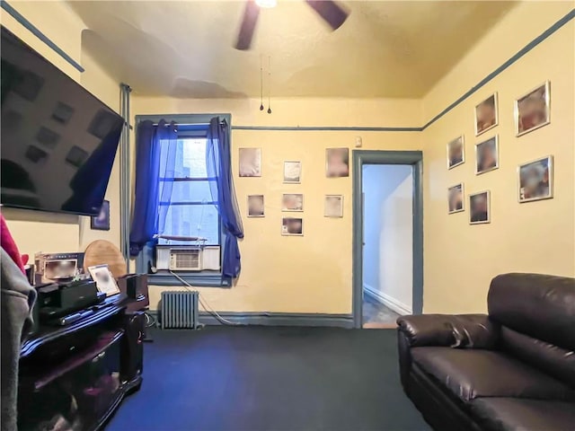 interior space featuring ceiling fan and cooling unit