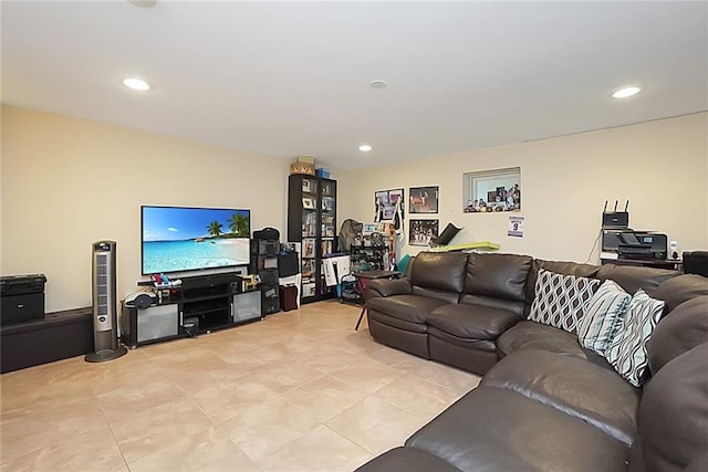 living room featuring light tile patterned flooring and recessed lighting