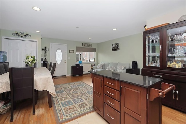 kitchen featuring a center island and light wood-type flooring