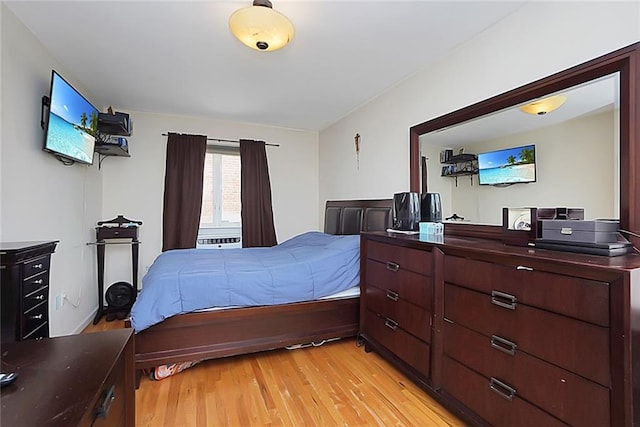 bedroom featuring light hardwood / wood-style floors