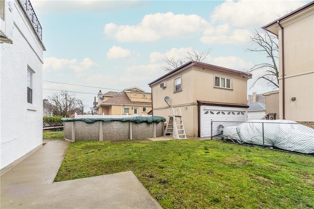 view of yard featuring a covered pool