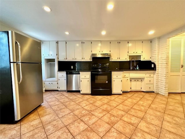 kitchen featuring backsplash, sink, light tile patterned floors, white cabinetry, and stainless steel appliances