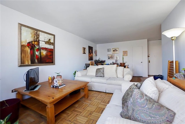 living room with parquet floors