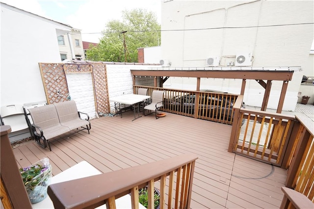 wooden deck featuring an outdoor living space