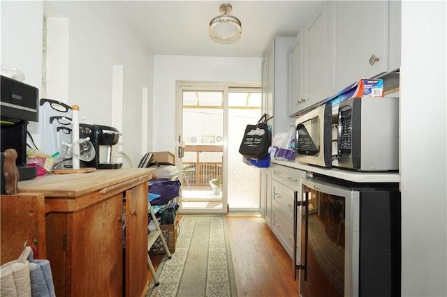 interior space featuring hardwood / wood-style floors and beverage cooler