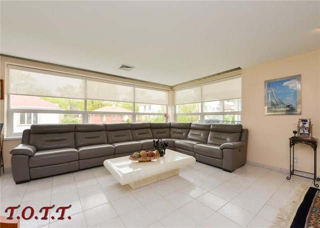 living room with light tile patterned floors