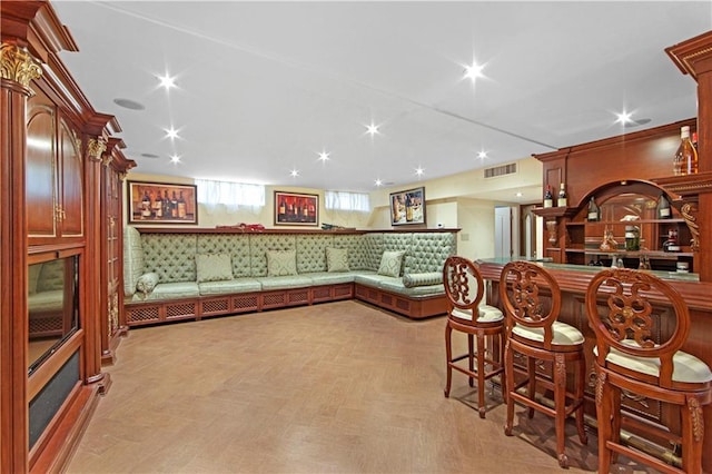 bar featuring light parquet flooring