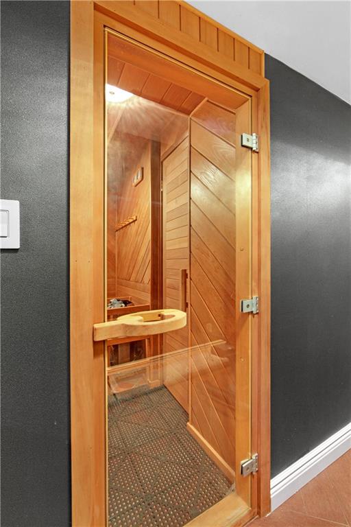 view of sauna / steam room featuring tile patterned floors