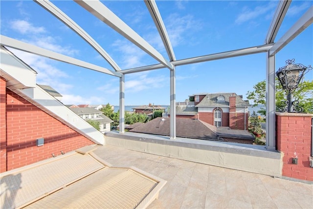 view of patio / terrace with glass enclosure