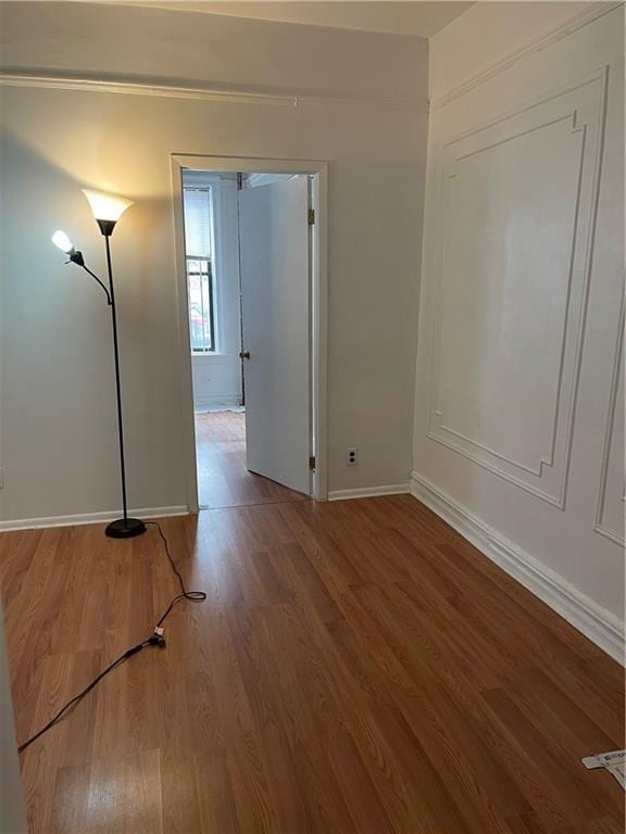 spare room featuring hardwood / wood-style floors