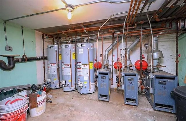 utility room featuring a heating unit and gas water heater