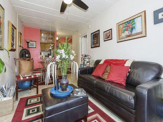 living room with ceiling fan