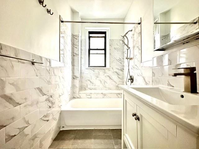 8020 4th Ave Unit D5, Brooklyn, NY 11209 - bathroom featuring tile walls, vanity, and shower / bath combination