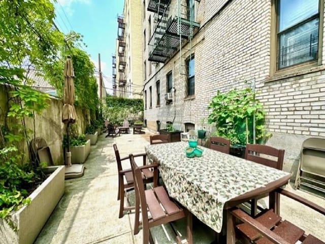 8020 4th Ave Unit D5, Brooklyn, NY 11209 - view of patio with outdoor dining area