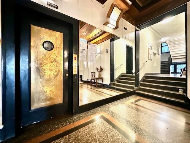 8020 4th Ave Unit D5, Brooklyn, NY 11209 - lobby featuring stairway and ornamental molding