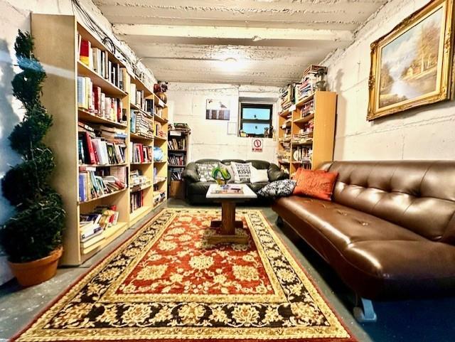 8020 4th Ave Unit D5, Brooklyn, NY 11209 - living area featuring concrete floors