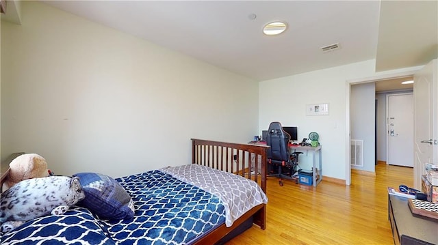 bedroom featuring hardwood / wood-style flooring