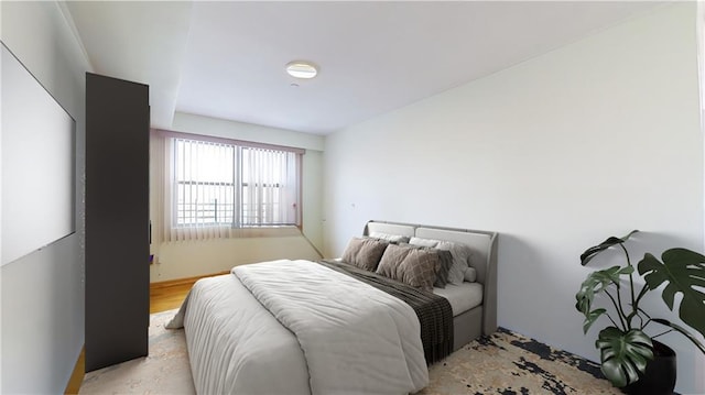 bedroom featuring light wood-type flooring