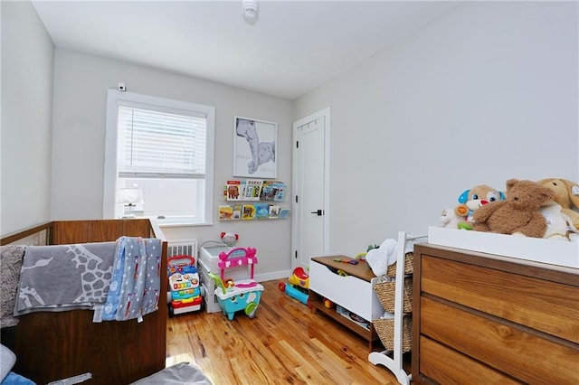 bedroom featuring hardwood / wood-style flooring