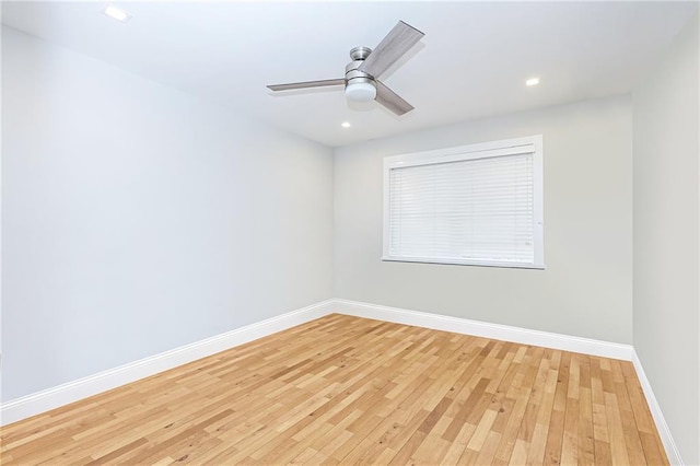 unfurnished room featuring recessed lighting, a ceiling fan, baseboards, and light wood-type flooring