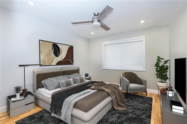 bedroom featuring ceiling fan and light wood-type flooring