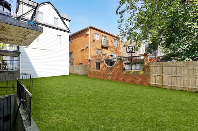 view of yard featuring fence