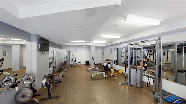 workout area featuring recessed lighting