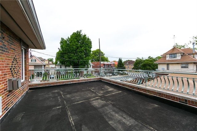 view of patio featuring a balcony