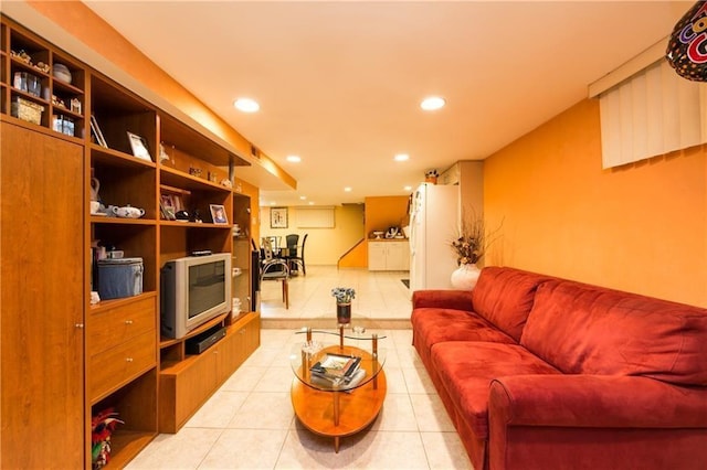 living room with light tile patterned flooring