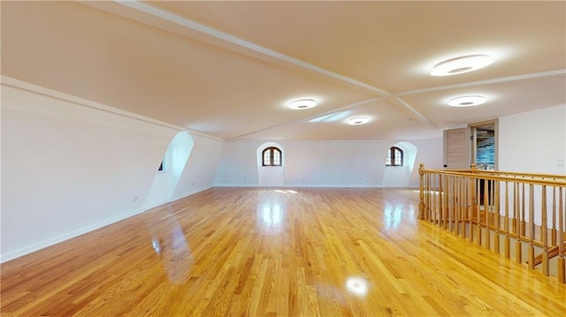 bonus room with hardwood / wood-style flooring