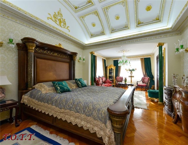 bedroom with parquet flooring, a chandelier, and crown molding