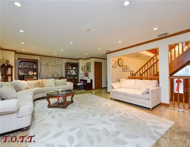 living room with ornamental molding