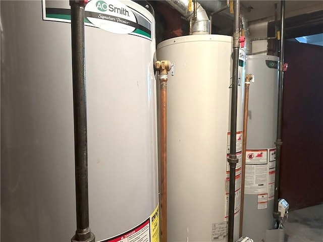 utility room featuring gas water heater