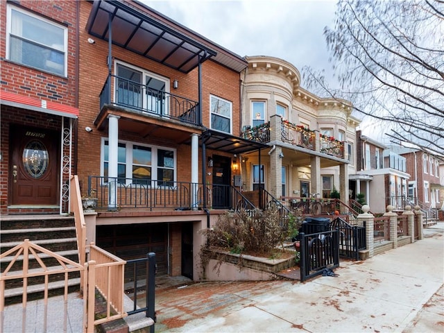 view of front of house featuring brick siding