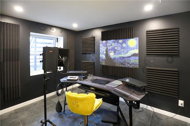 office area featuring tile patterned floors and baseboards